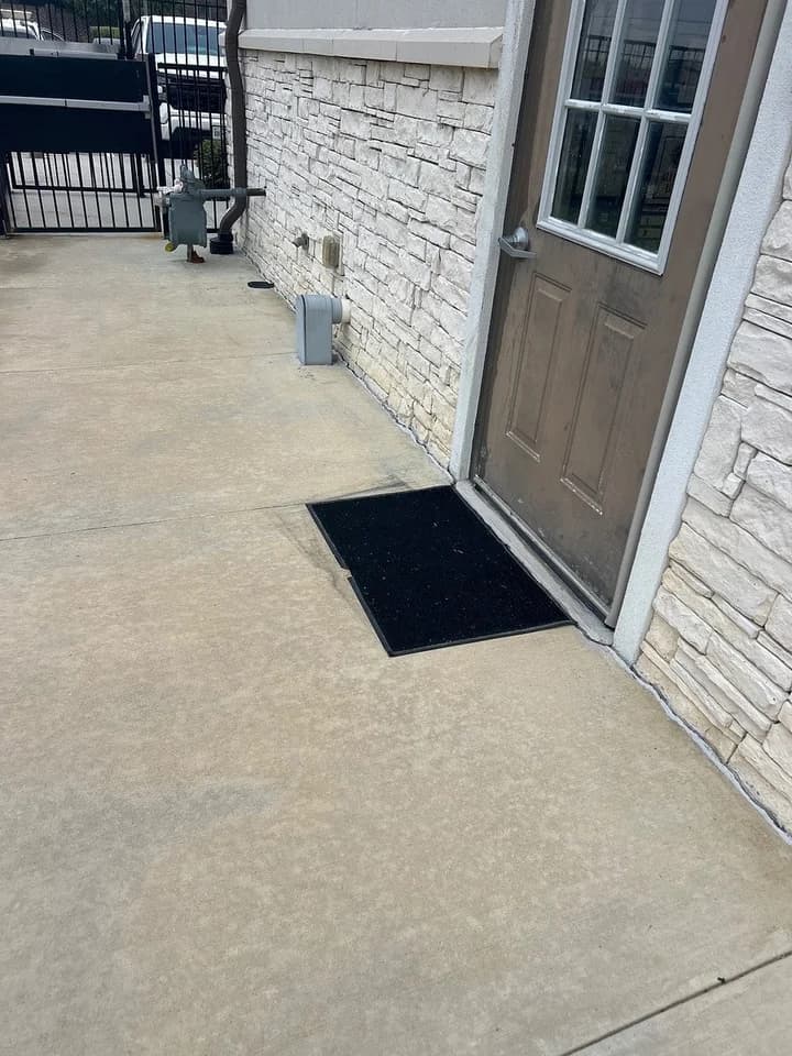 Debris cleared from an exterior door, after