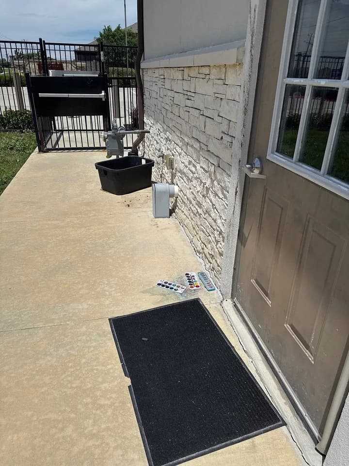 Debris cleared from an exterior door, before
