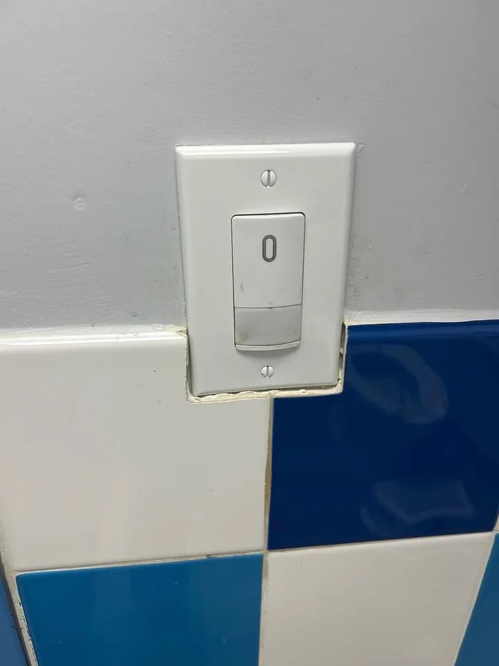 Broken restroom cover plate replaced, after